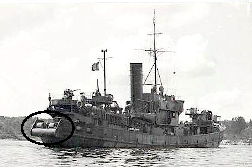 Gros plan sur le lanceur de grenade